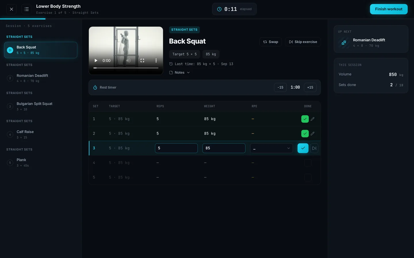 Live session screen logging a back squat with a rest timer, set table and up-next card